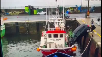 A car sinks in a port in Spain